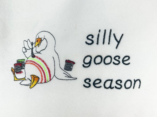 Embroidered "silly goose season" unisex sweatshirt