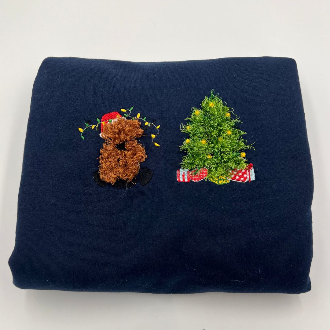 Fluffy Highland cow and Christmas tree embroidered unisex sweatshirt