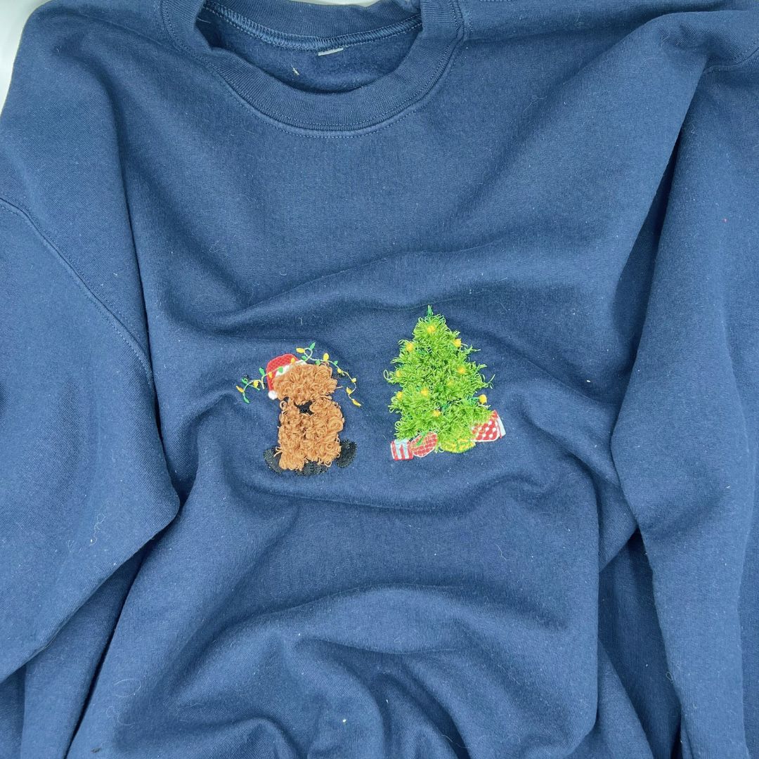 Fluffy Highland cow and Christmas tree embroidered unisex sweatshirt