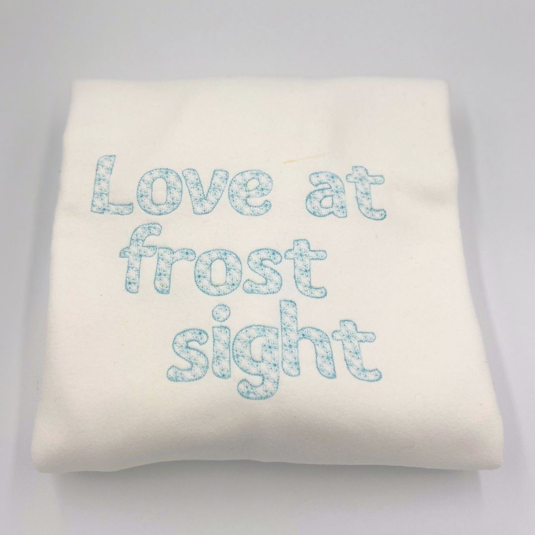 Embroidered "love at frost sight" unisex Christmas sweatshirt