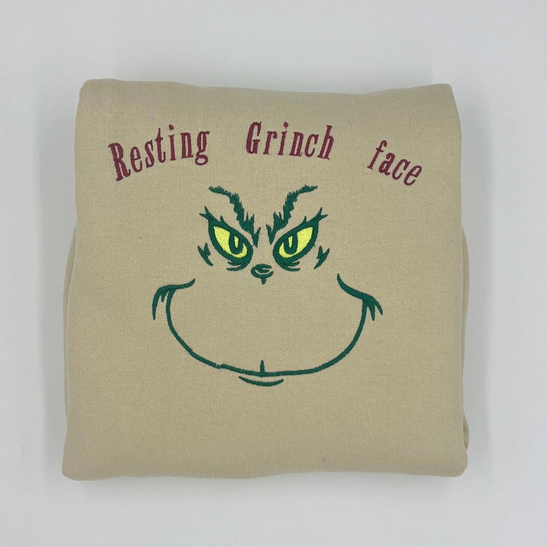 Embroidered "Resting Grinch face" unisex Christmas sweatshirt