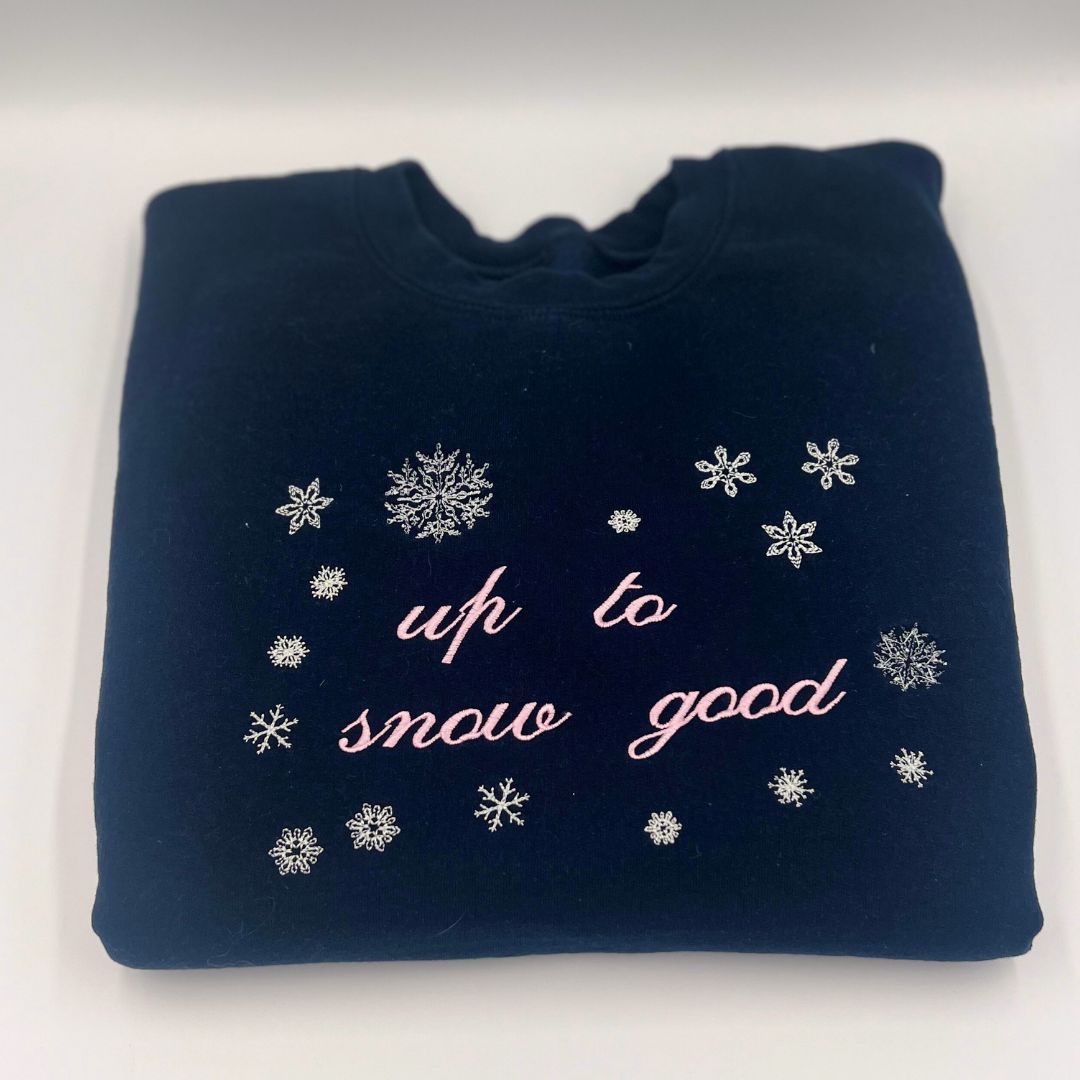 "up to snow good" embroidered unisex Christmas sweatshirt